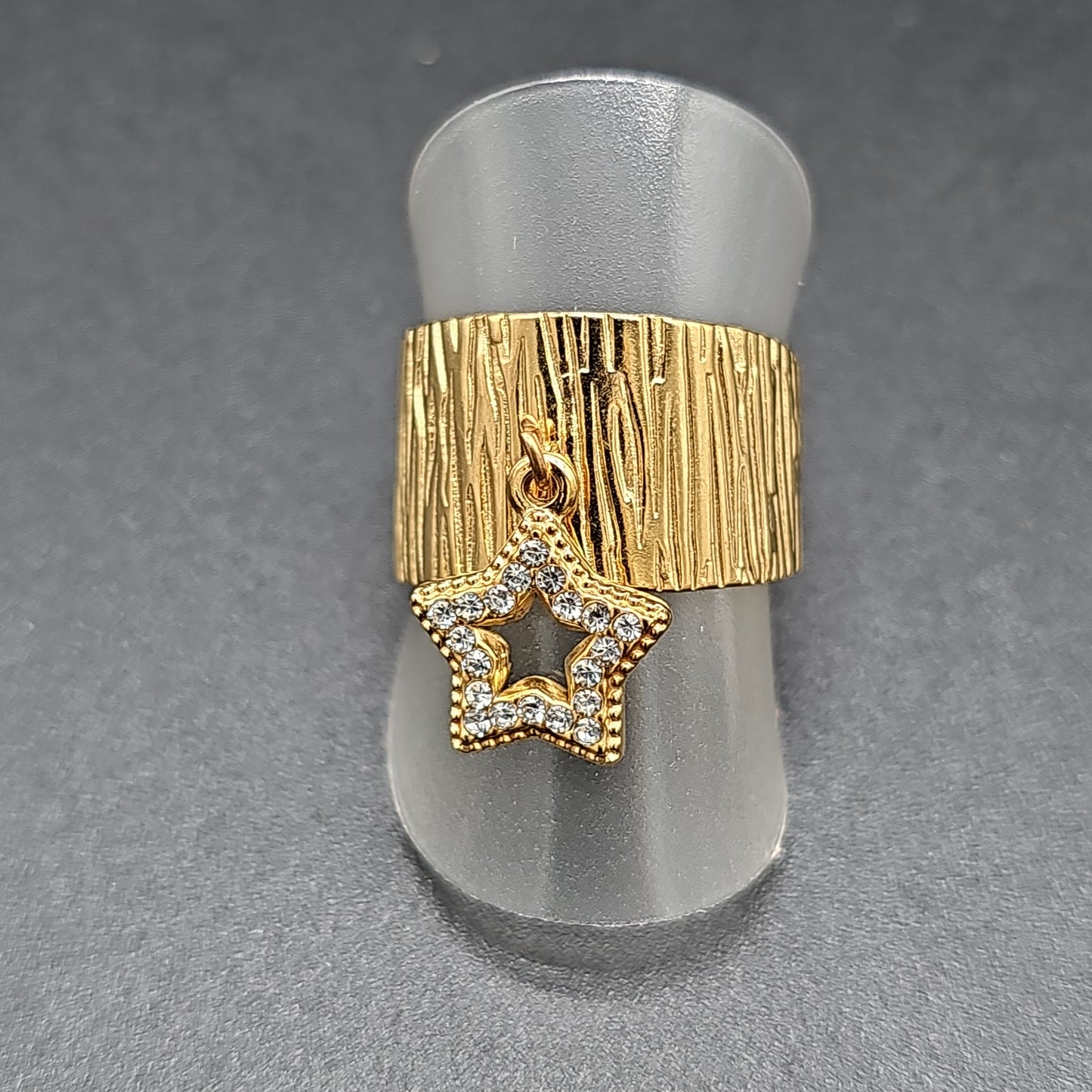 Bague anneau large ajustable acier inoxydable doré ou argenté – étoile ajourée strass
