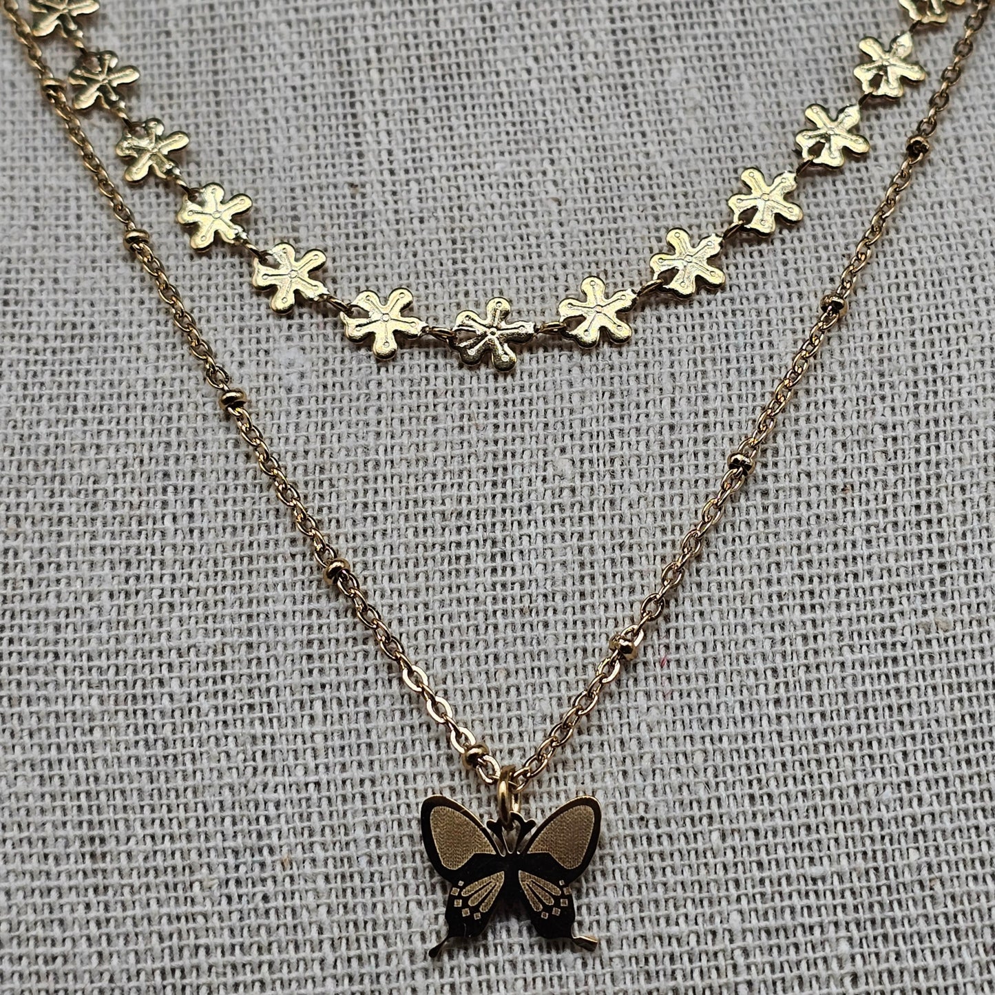 Collier sautoir double rang doré acier inoxydable – Chaînes fantaisie papillon et fleurs ciselées