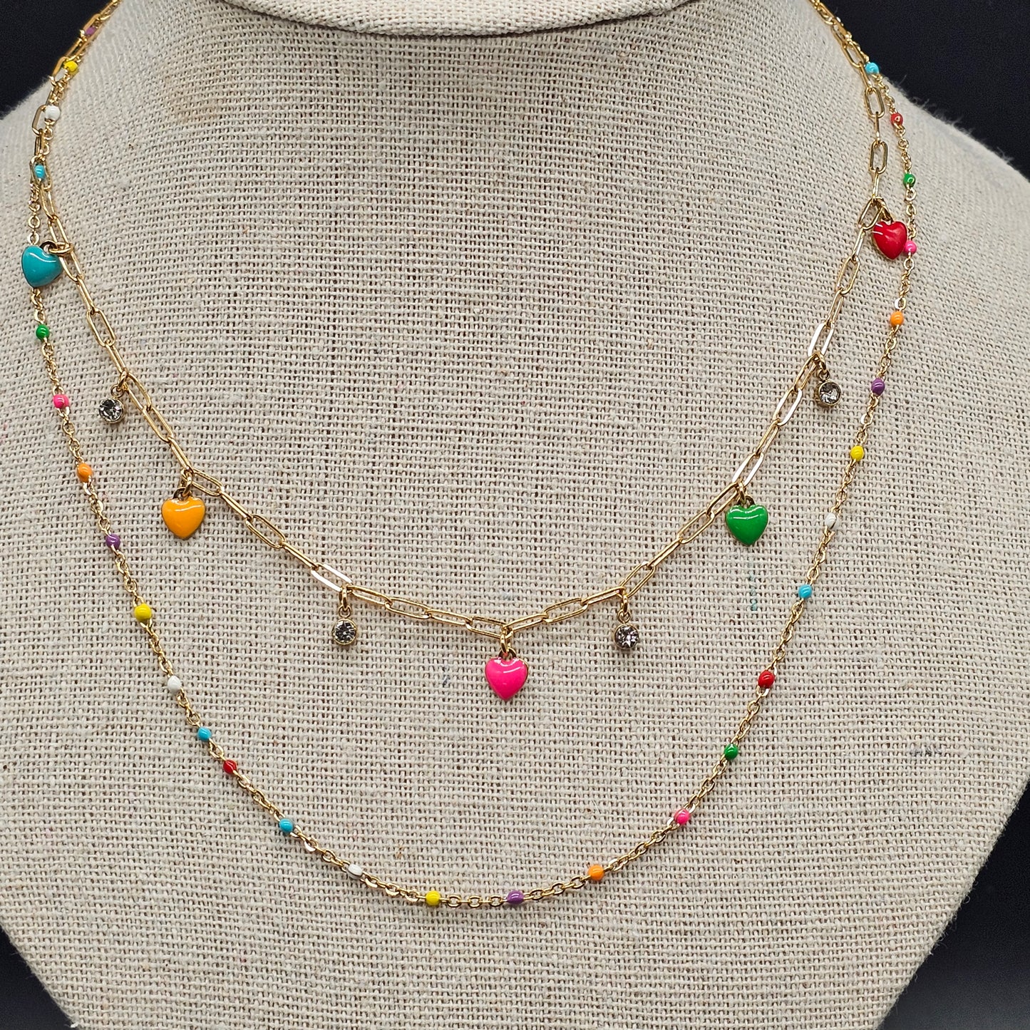 Collier "good vibes" double chaîne acier inoxydable doré chaîne maille forcat perle en pierre reconstituée pampille coeur et perle et strass
