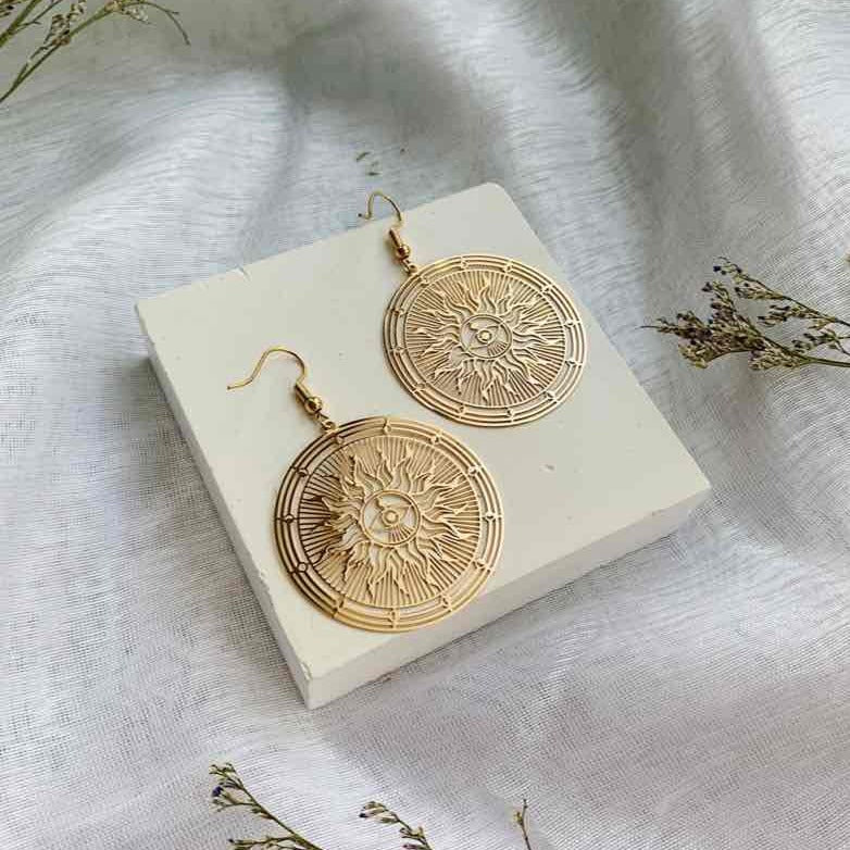 Boucles pendantes motif soleil acier inoxydable doré ou argenté