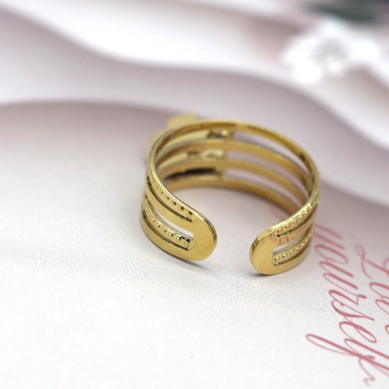 Bague multi-anneaux dorée ajustable acier inoxydable trèfle et pastille