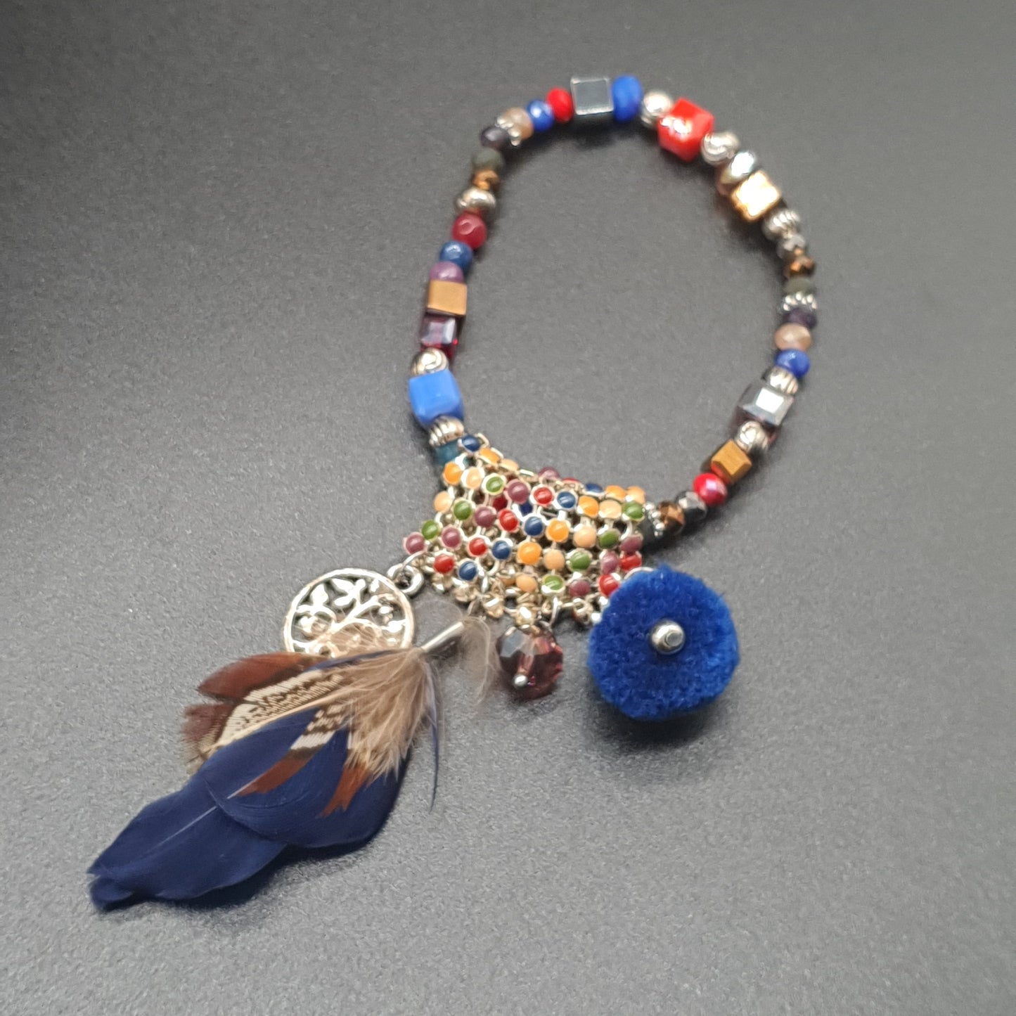 Bracelet élastique perles multicolores avec pièce tissée métal doré