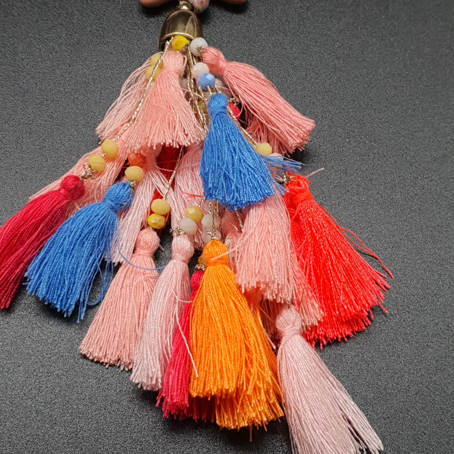 Bijou de sac porte clés style bohème étoile colorée perles pierre effet marbré pompons tassel multicolores fils de polyester perles fantaisie