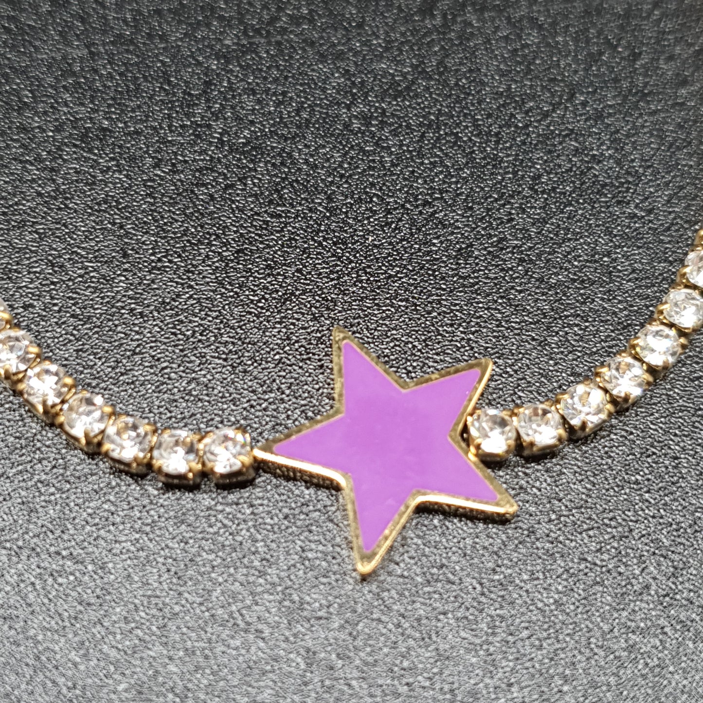 Bracelet doré acier inoxydable maille sertie de strass blancs et pendentif étoile émaillée violette