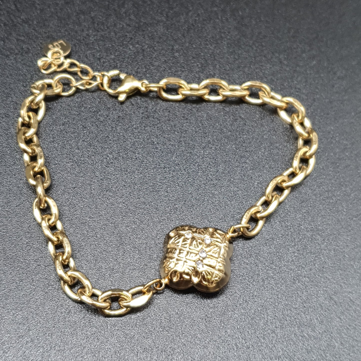 Bracelet acier inoxydable doré grosse maille forçat et pendentif trèfle doré satiné