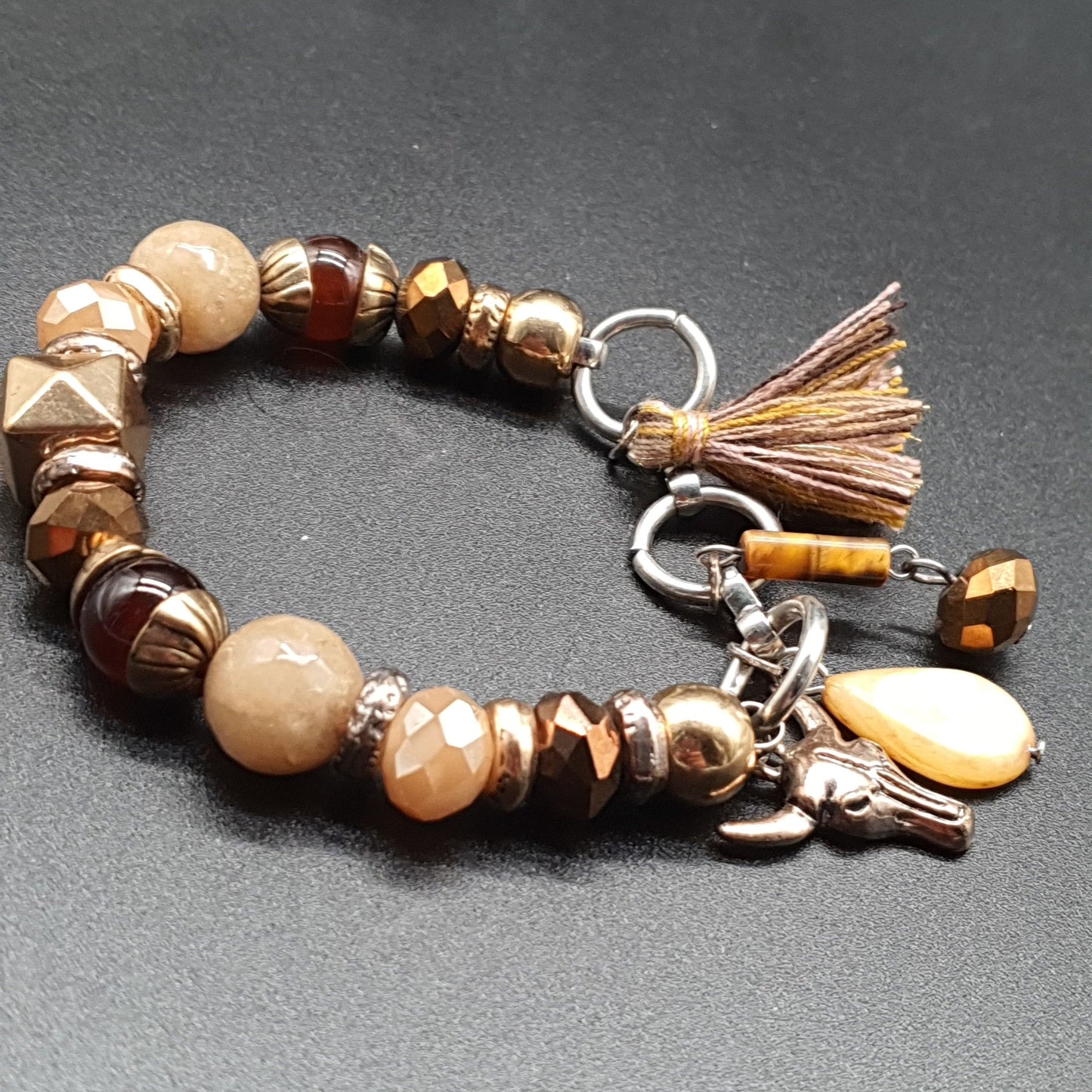 Bracelet élastique perles facettées doré pampille cœur et aile d’ange