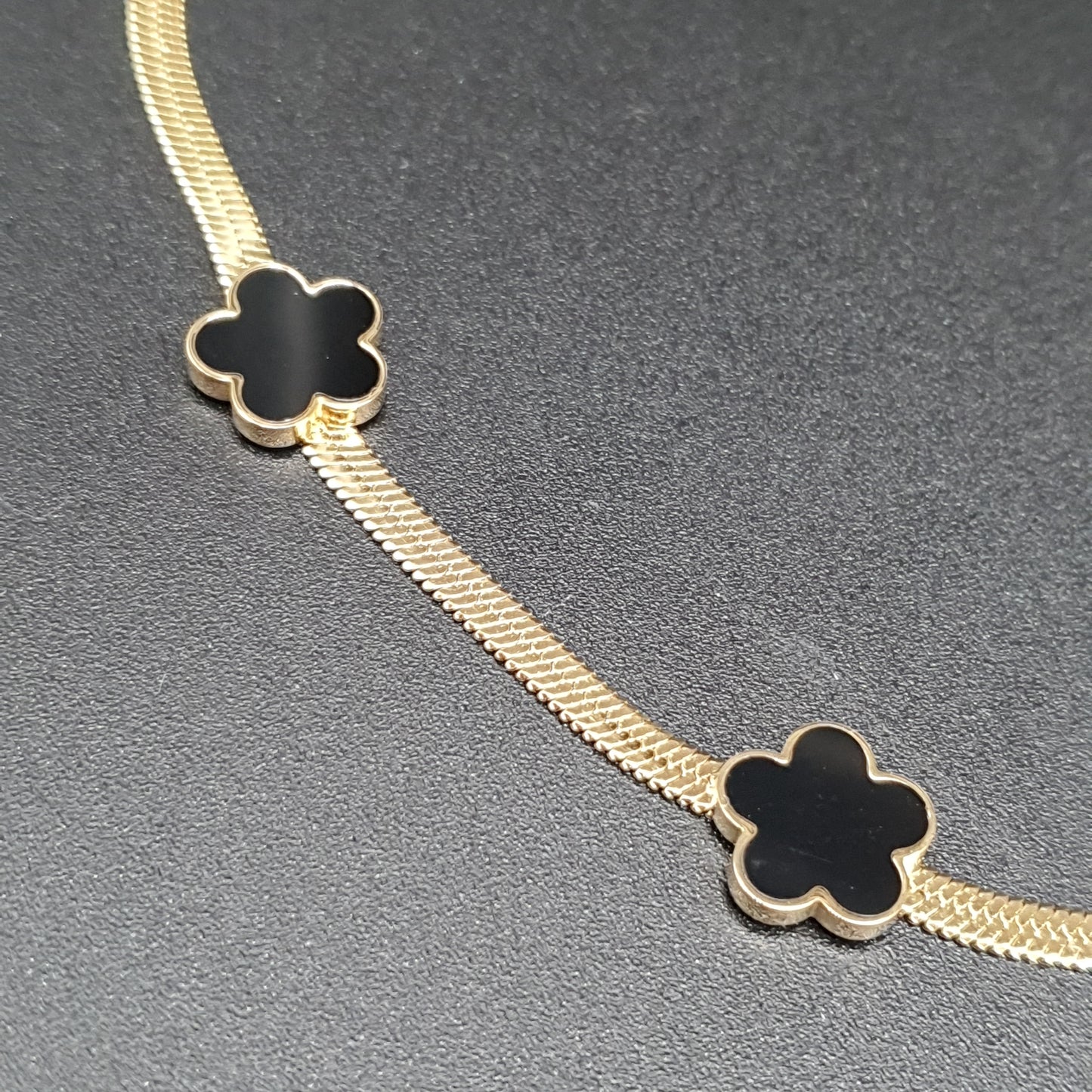 Collier acier inoxydable doré maille miroir fleurs dorées nacre ou noir