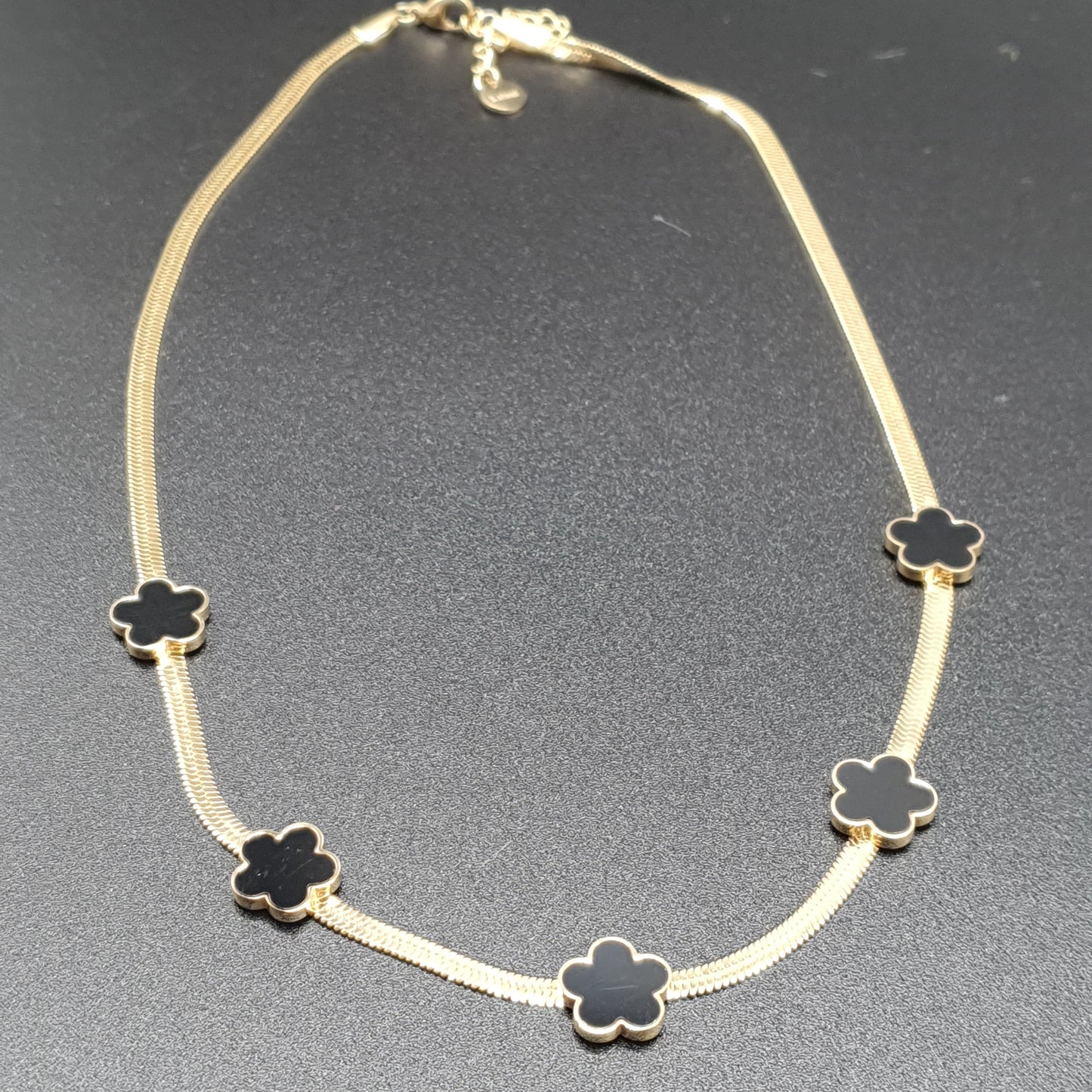 Collier acier inoxydable doré maille miroir fleurs dorées nacre ou noir