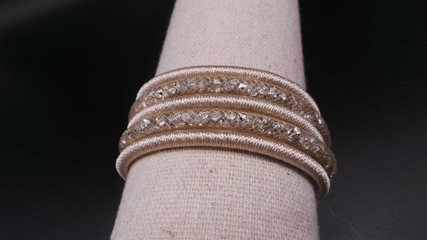 Bracelet manchette aimanté multi-brins strass fils métallisés