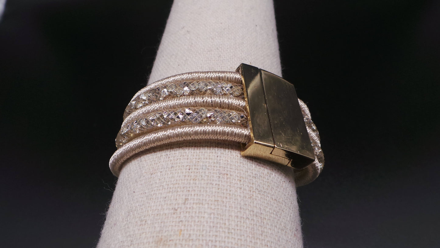 Bracelet manchette aimanté multi-brins strass fils métallisés