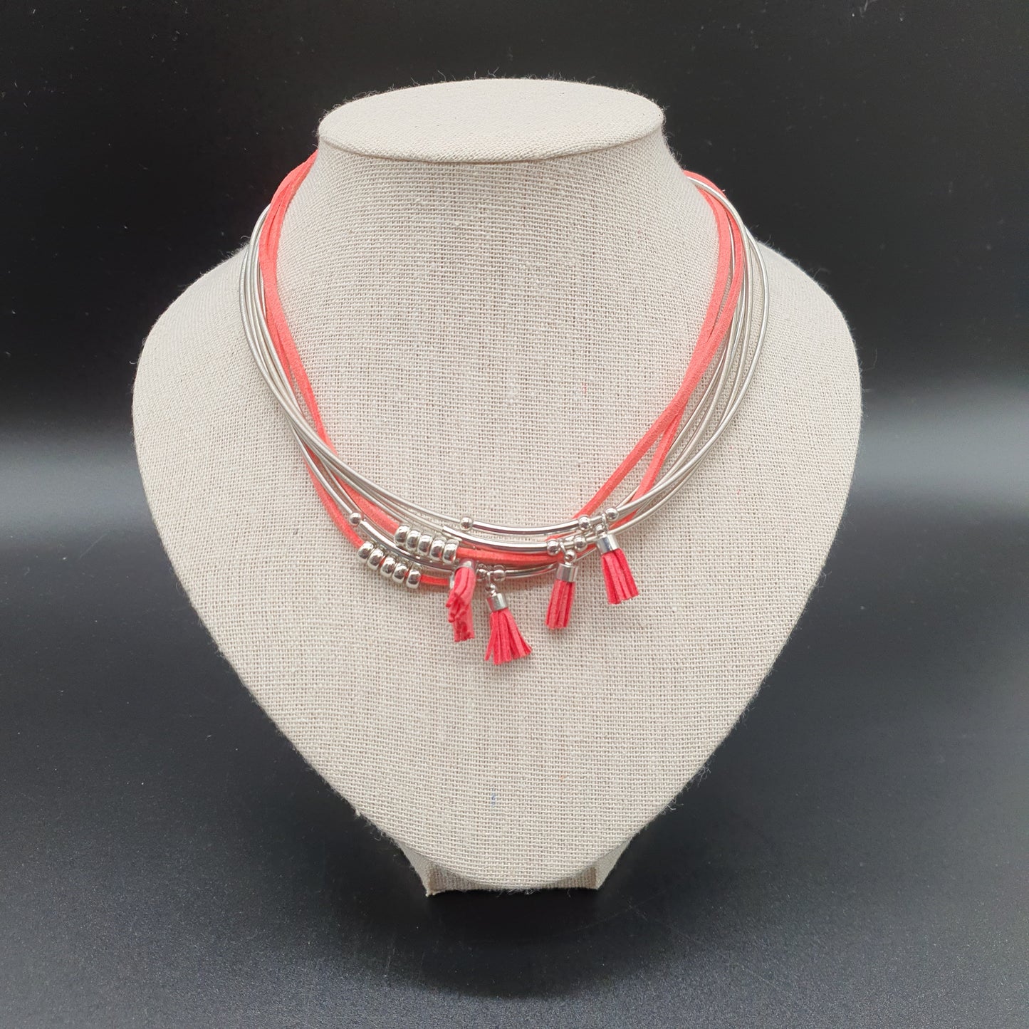 Red multi-strand magnetic necklace with memory wire, silver-plated metal beads, and faux suede