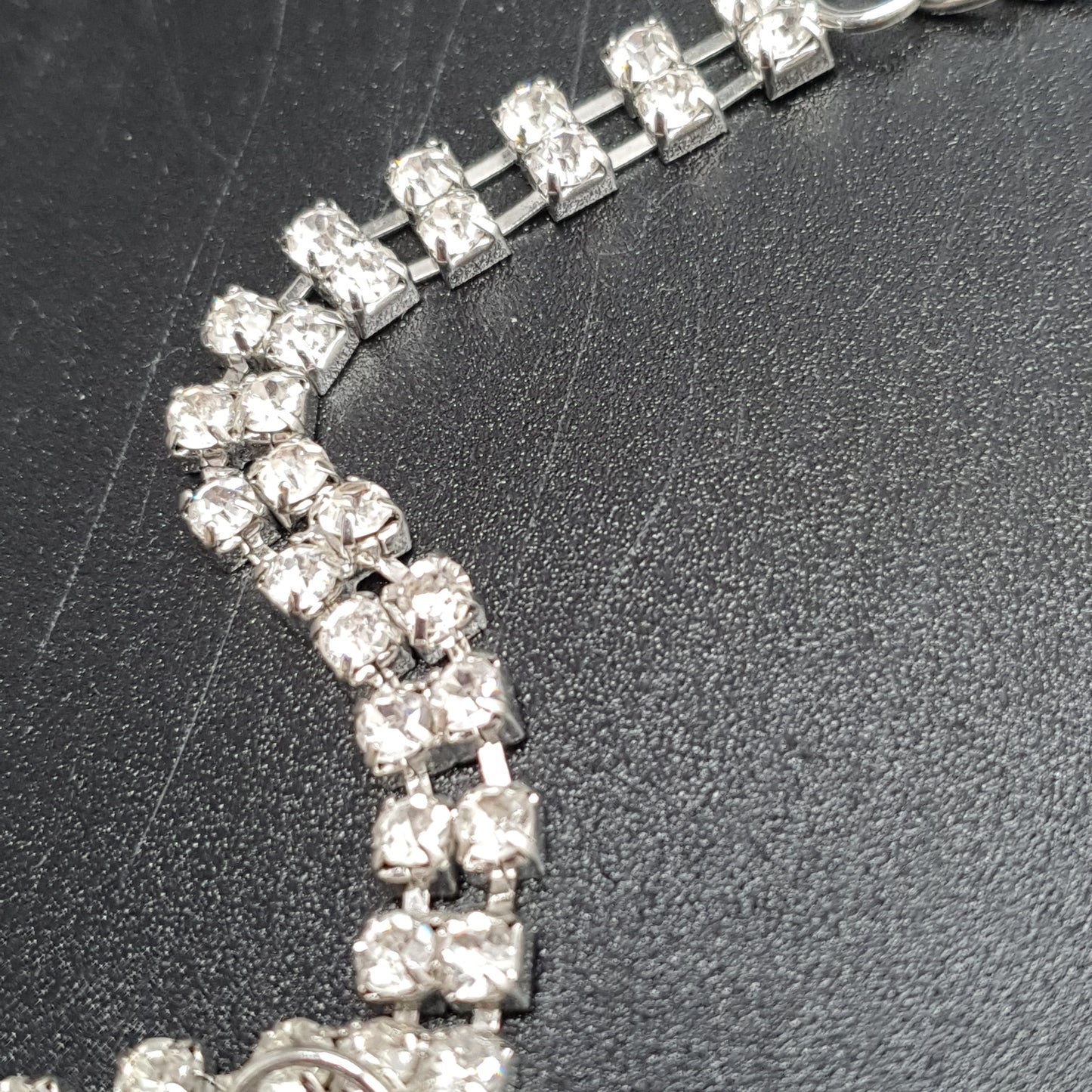 Stainless steel silver-plated bib necklace with rhinestones and black metal chains
