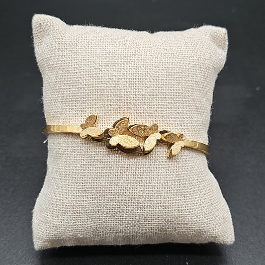 Bracelet jonc doré ouvrable – 4 papillons 3D ailes dorées