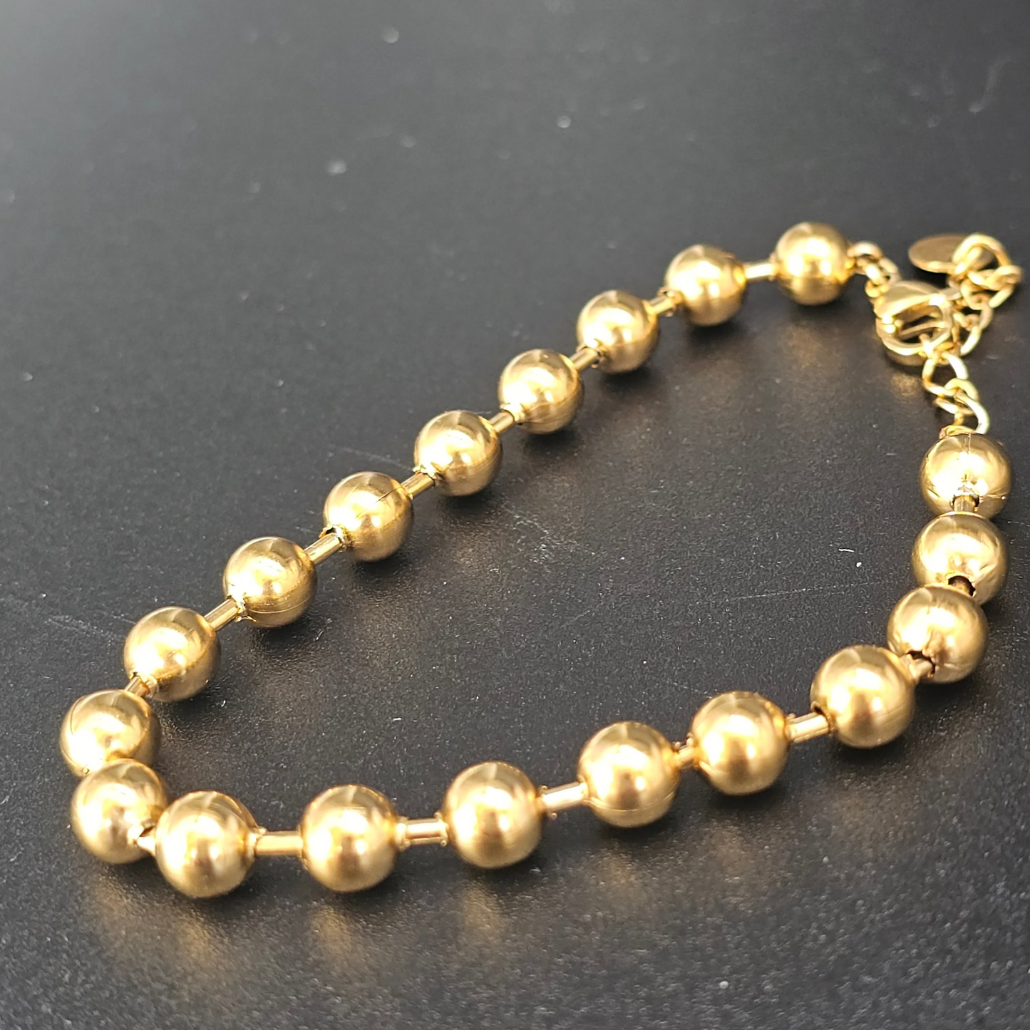 Bracelet billes dorées 6 mm – acier inoxydable