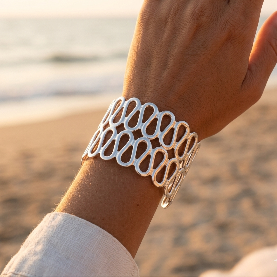 Openwork stainless steel cuff bracelet with wave pattern – gold or silver plated