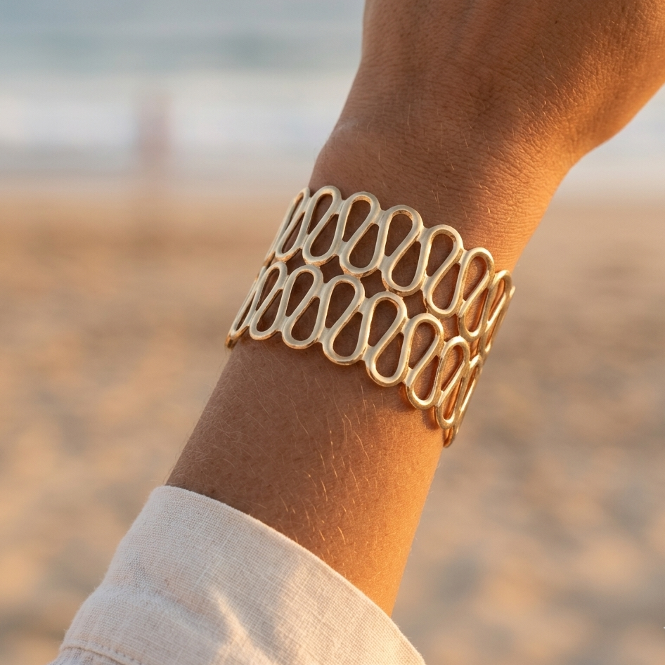 Openwork stainless steel cuff bracelet with wave pattern – gold or silver plated