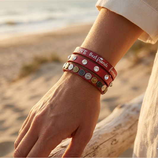 Adjustable red faux leather multi-wrap bracelet – snap fasteners and engraved "Love" metal pieces