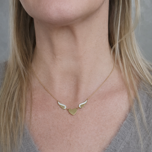 Collier doré en acier inoxydable – Cœur et ailes strass