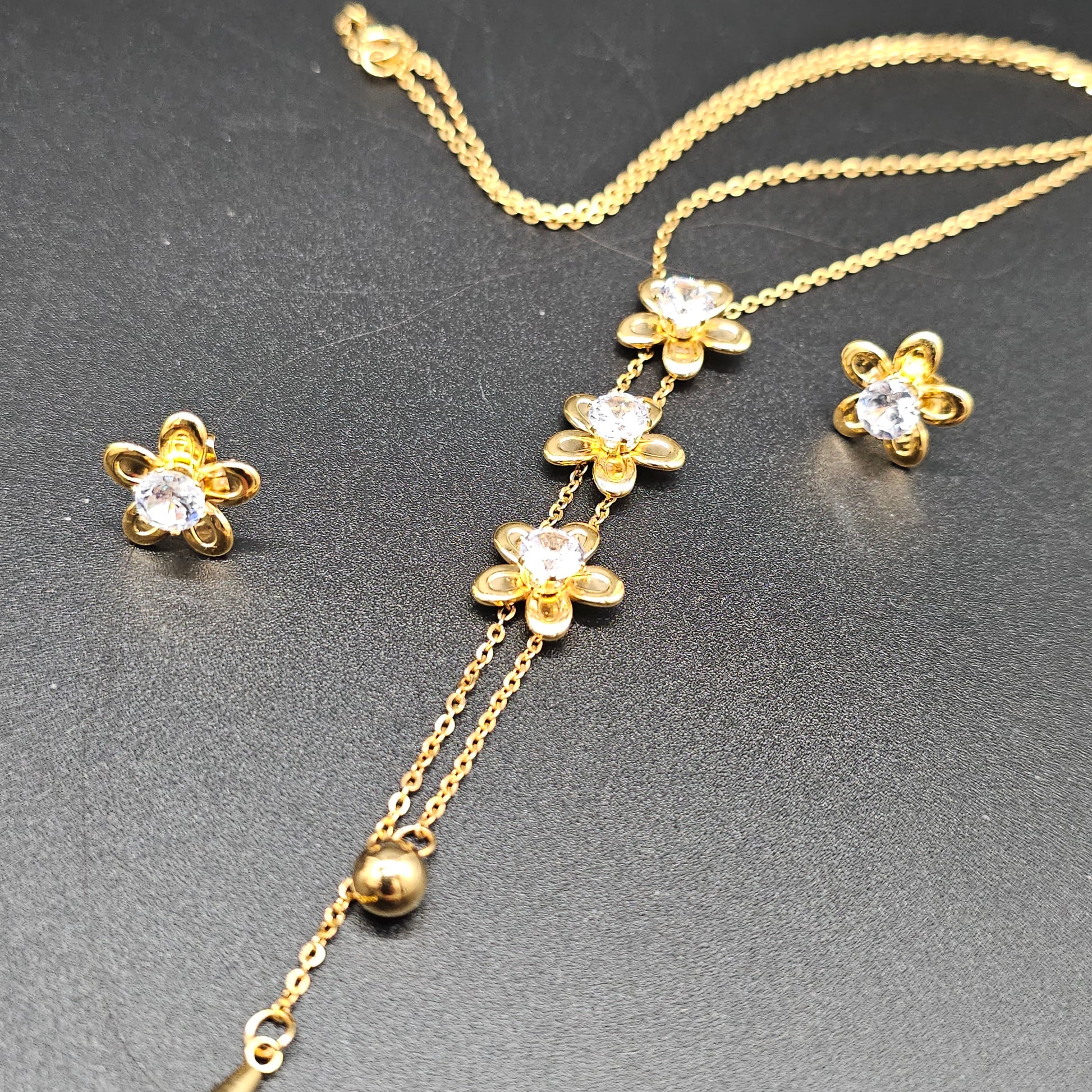 Parure dorée fleurs cristal – collier et boucles d’oreilles Bijoux Nice