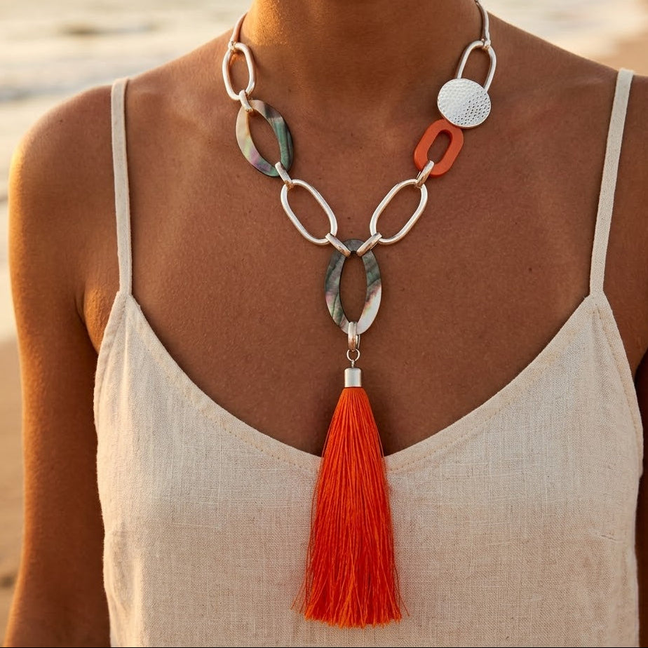 Orange long necklace with snake chain, silver-plated metal rings, mother-of-pearl, wood & tassel