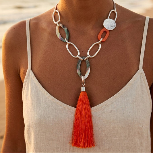 Orange long necklace with snake chain, silver-plated metal rings, mother-of-pearl, wood & tassel