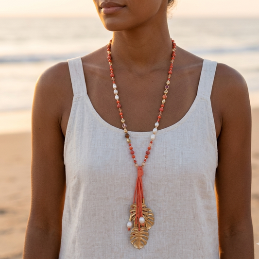 Long orange necklace in faux suede, mother-of-pearl beads, crystal, golden leaf pendant