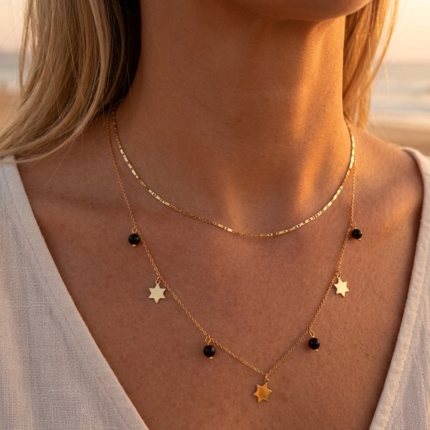 Double-layered Necklace with Stars & Black Beads – Gold-plated Stainless Steel