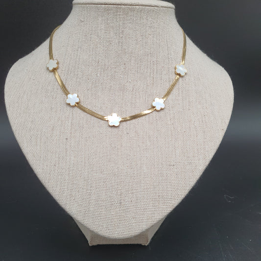 Collier acier inoxydable doré maille miroir fleurs dorées nacre ou noir
