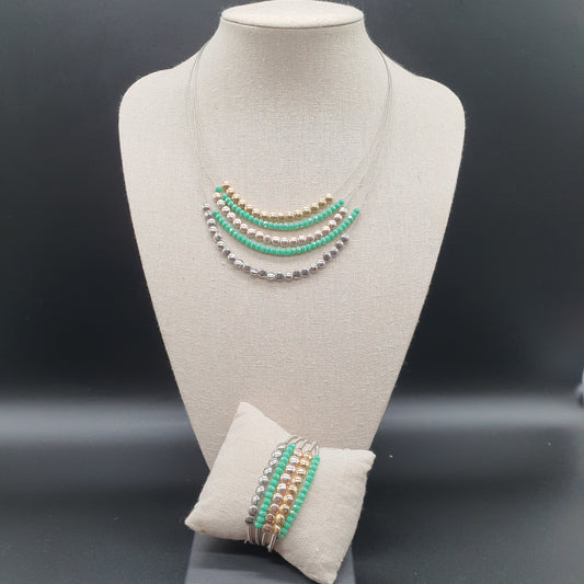 Parure collier bracelet aimanté multi-rangs cables fins spiralés pièces rondes métal argenté doré cristal coloré