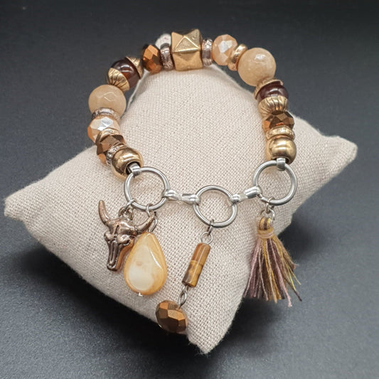 Bracelet élastique perles facettées doré pampille cœur et aile d’ange
