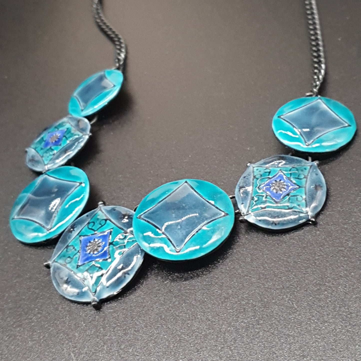 Silver-plated stainless steel necklace – round blue enameled pendants