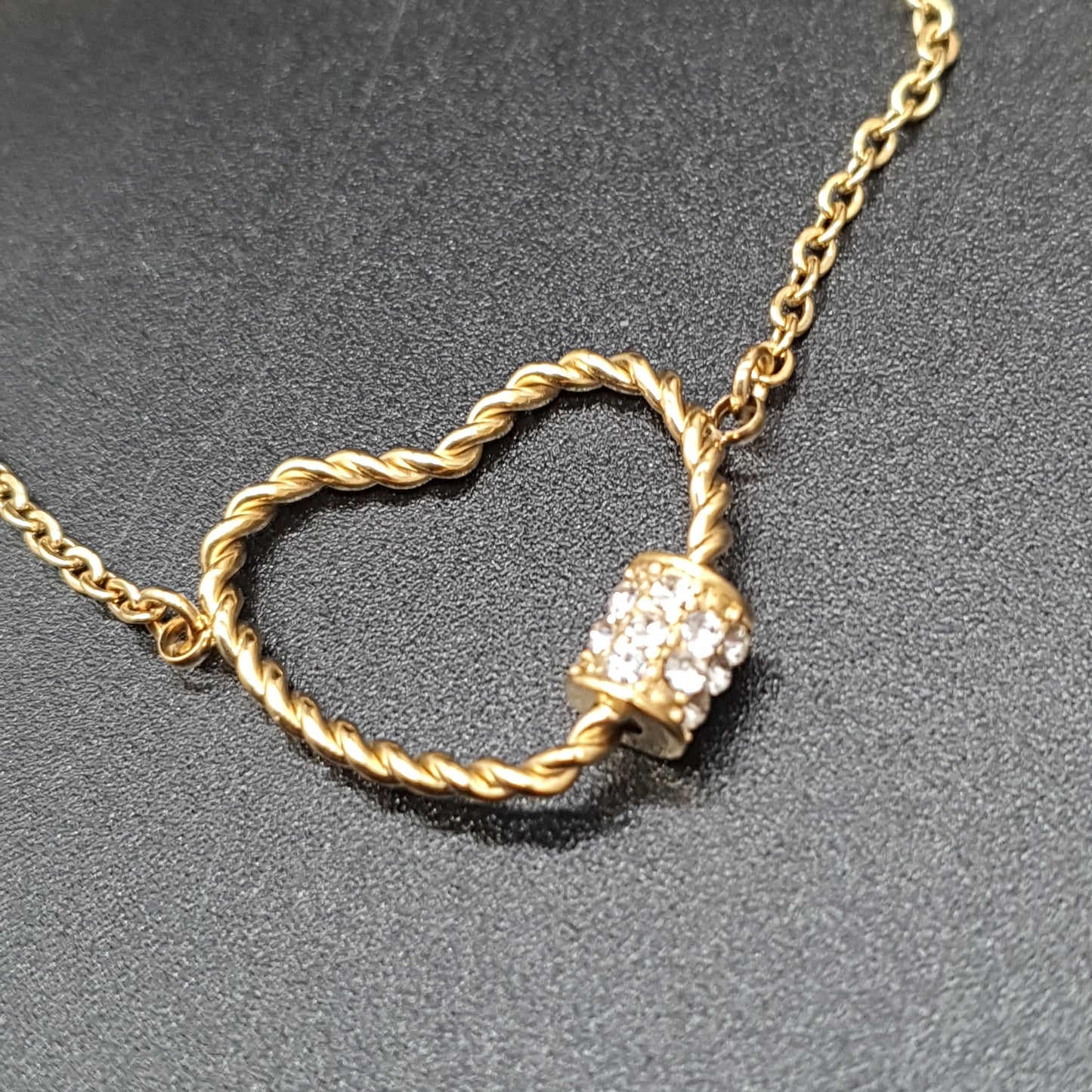 Lilas de Seine Gold-Plated Steel Bracelet with Openwork Twisted Heart and Rhinestones