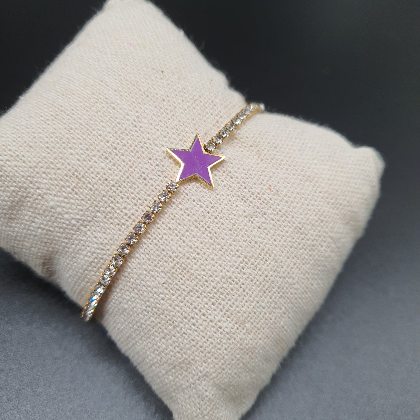 Gold stainless steel bracelet with mesh set with white rhinestones and purple enamel star pendant