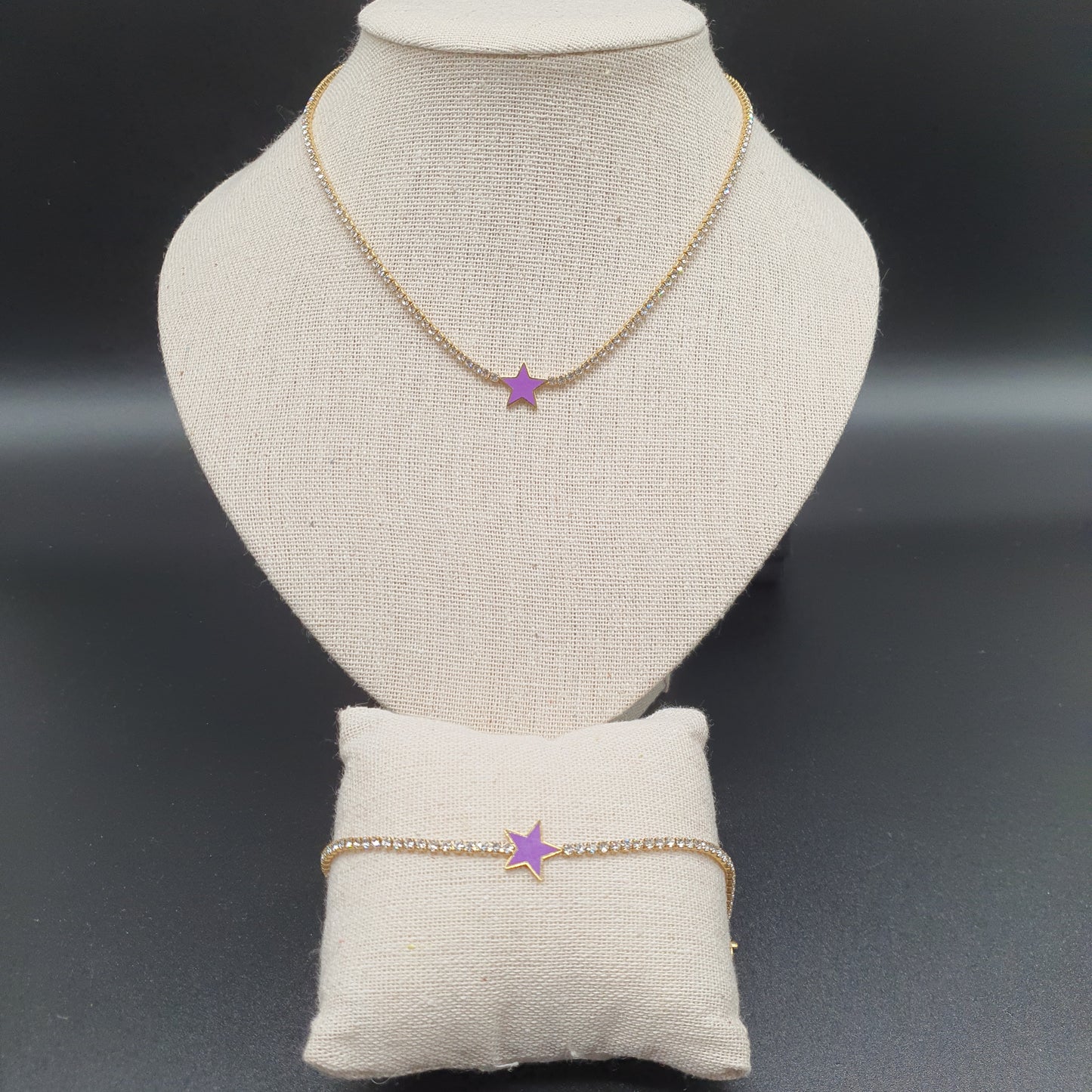 Gold stainless steel bracelet with mesh set with white rhinestones and purple enamel star pendant