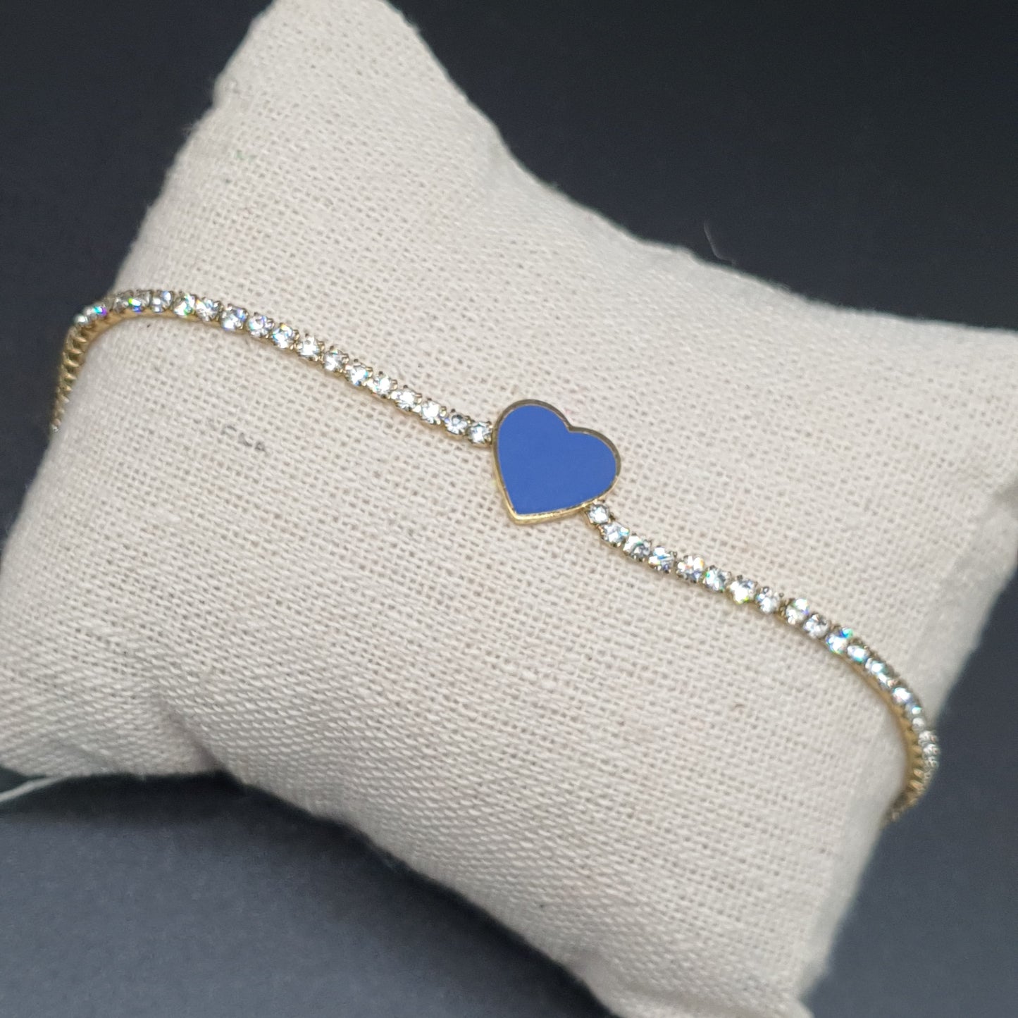 Gold-plated stainless steel bracelet with mesh set with white rhinestones and a blue enamel heart pendant