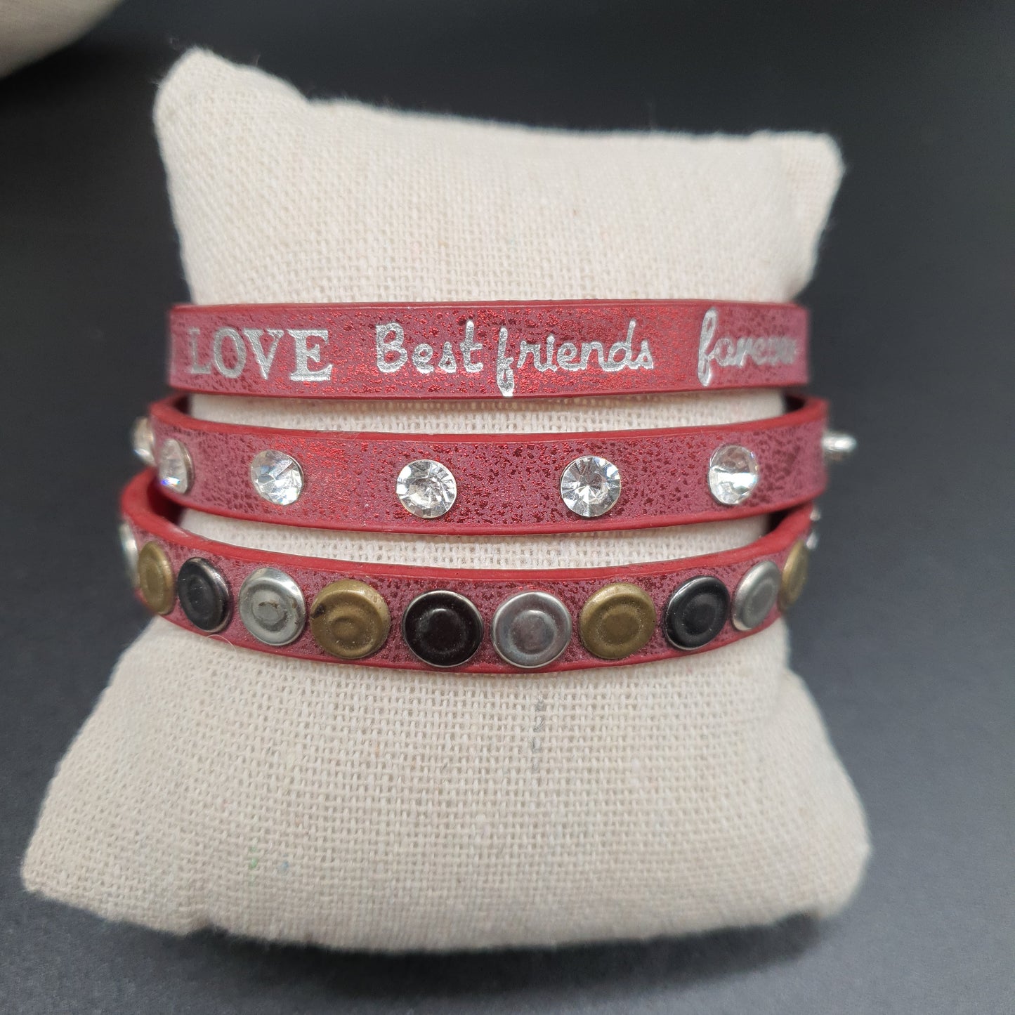 Adjustable red faux leather multi-wrap bracelet – snap fasteners and engraved "Love" metal pieces