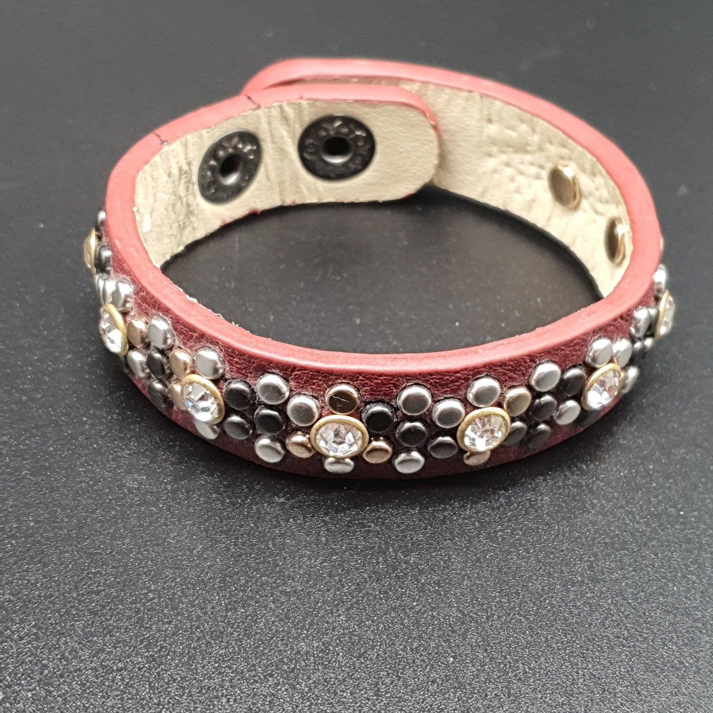 Adjustable faux leather bracelet with snap closure - brown crystal carved metal pieces
