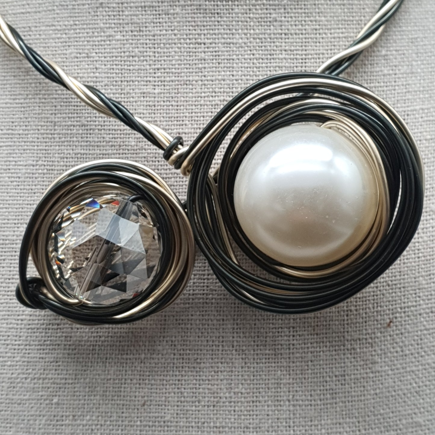 Multi-position modular necklace – twisted cables & metal spiral, central pearl