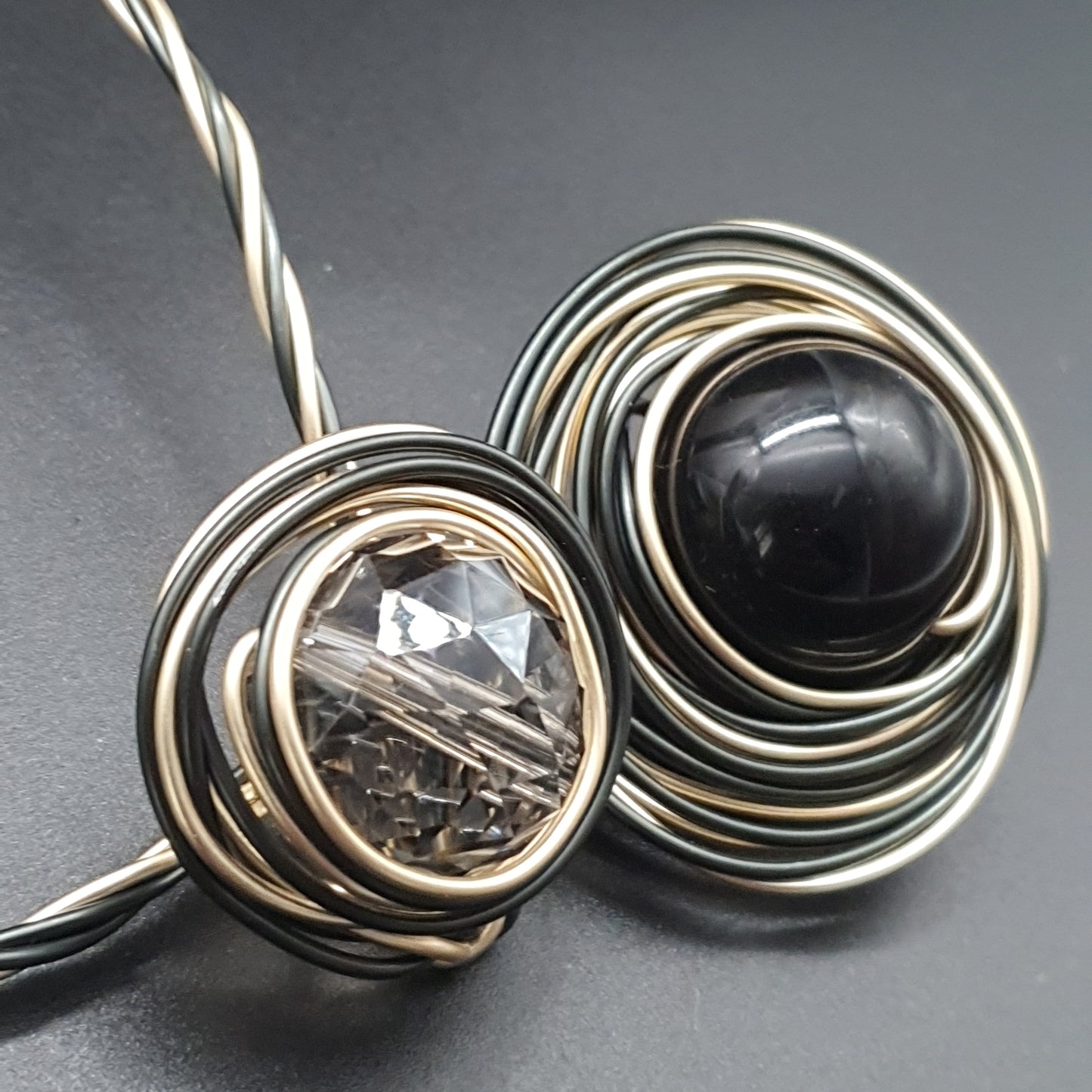 Multi-position modular necklace – twisted cables & metal spiral, central pearl