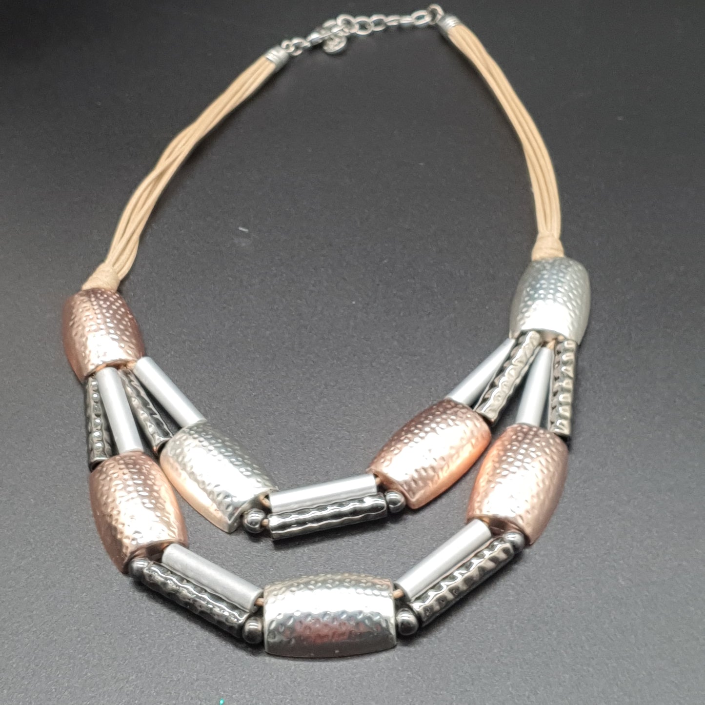 Double-strand necklace with multi-cord waxed cotton & hammered gold and silver metal half-tubes