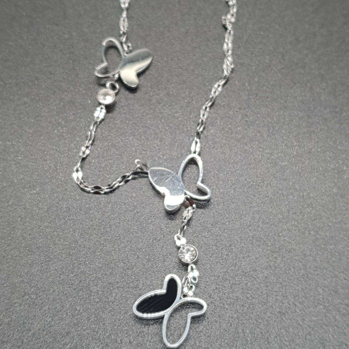 Stainless steel gold or silver long necklace – twisted mother-of-pearl butterfly pendant