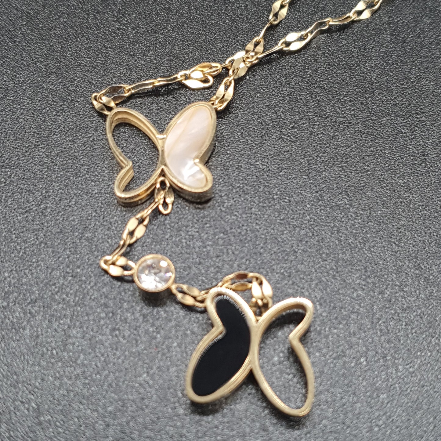 Stainless steel gold or silver long necklace – twisted mother-of-pearl butterfly pendant