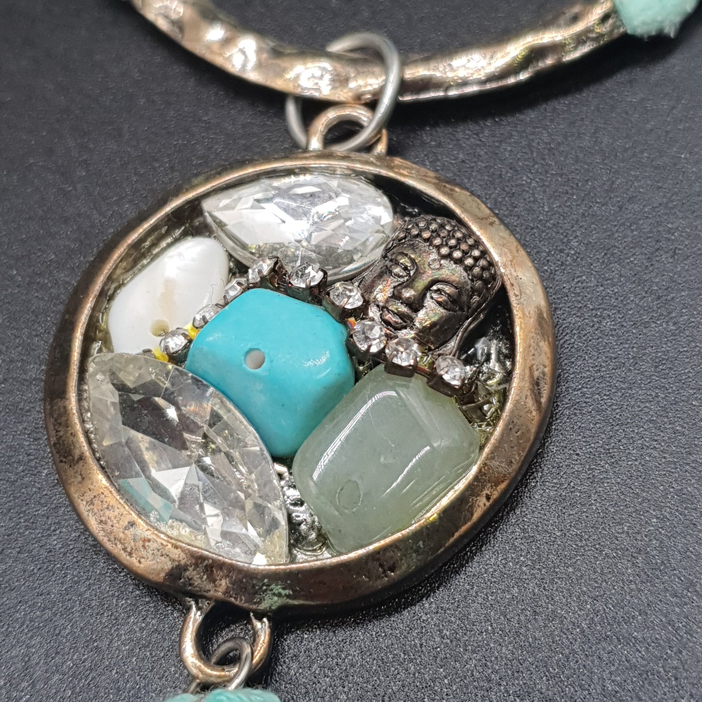 Silver-plated metal long necklace with a mesh tube chain and Buddha pendant