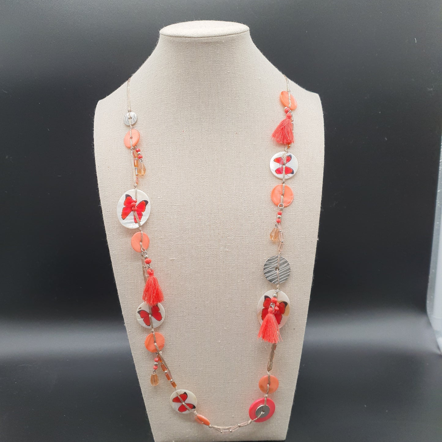 Pink multi-strand long necklace – Mother-of-pearl, silver butterfly & tassels
